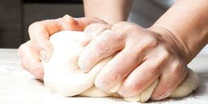 Hands-Kneading-Dough